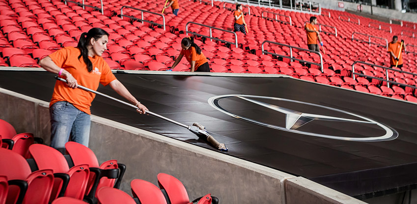 Level Seven staff cleaning a stadium